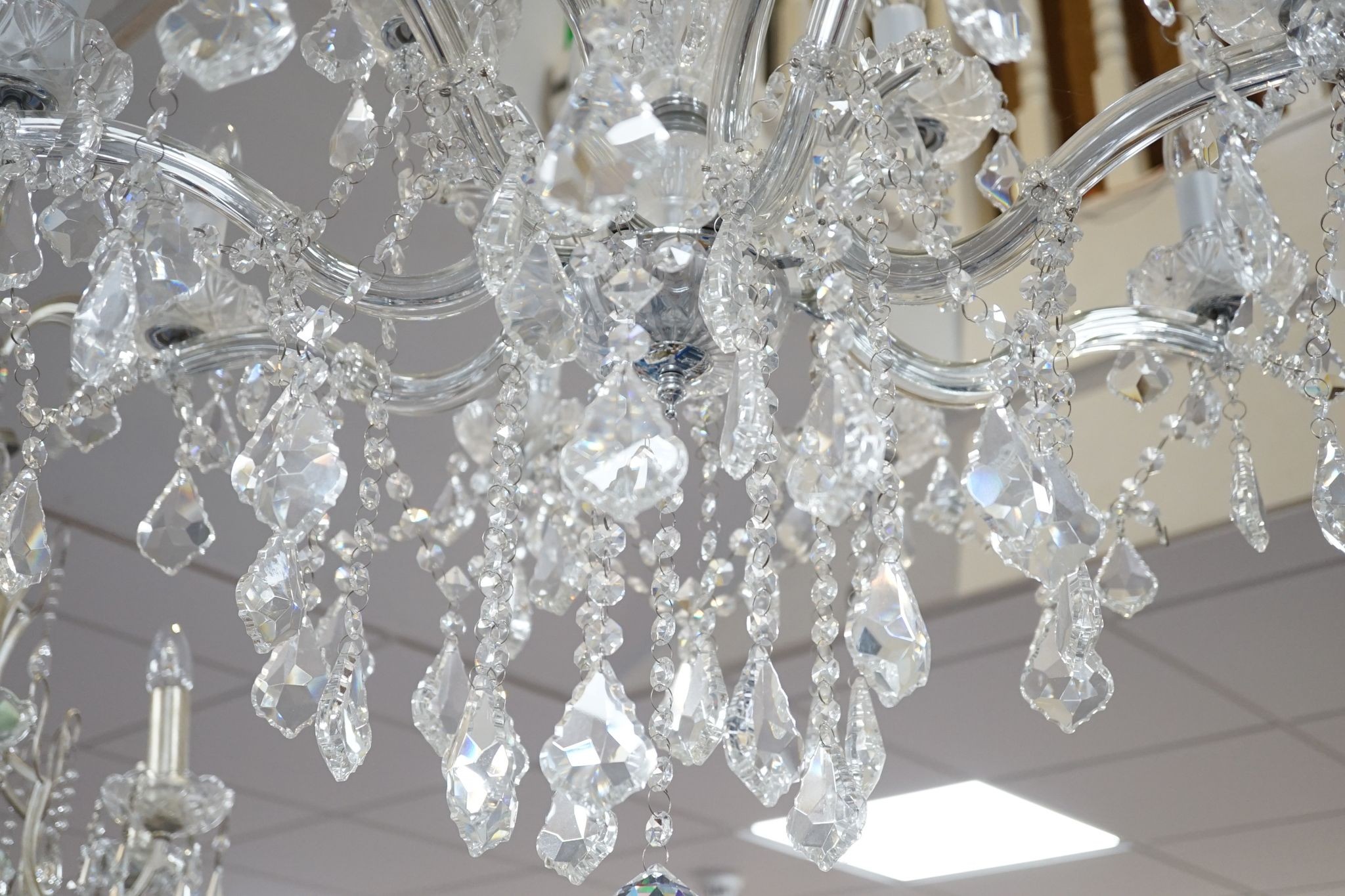 An 8 branch, 12 light chandelier